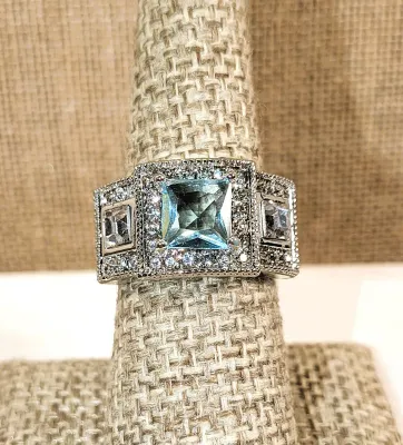 **New Arrival** Size 7½ Beautiful Large BEJEWELED RING with Light Blue Main Stone Side Accent Square Stones, Jeweled Surround, & Blue...