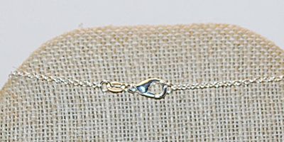 "MILLER'S BLACKHAWK DAYTON, OHIO" PENDANT (1" x 1") on a Silver Tone NECKLACE CHAIN 16" L