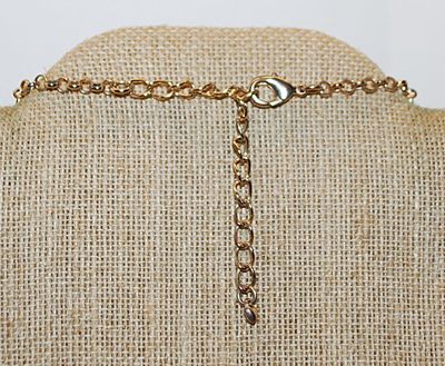 Beige TEARDROP STONES NECKLACE Outlined in Gold Colored Setting with a Lobster Clasp 18" L