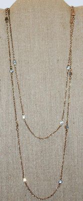 Long WRAP-AROUND 4 Strand NECKLACE - Marked "EXPRESS" - with Cupped Round Clear Stone Accents on a Gold Tone Chain and Lobster...