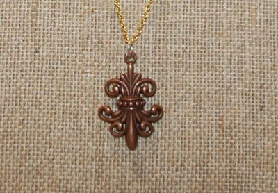 "Fleur-de-Lis" Style Brown PENDANT (1" x ¾") on a Gold Tone Necklace Chain 17" L
