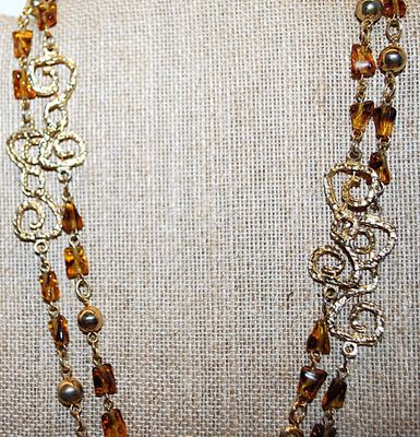 Gold Colored "Figure 8" Swirls WRAP-AROUND NECKLACE with AMBER "Chunk" Stone Accents on a Gold Tone Chain and Circle...