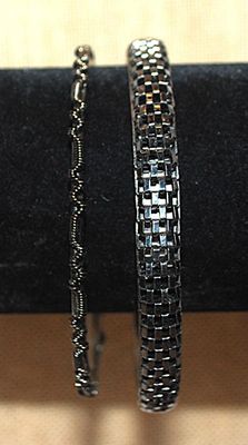 Collection of 2 BLACK BRACELETS (-2½"+ Opening) in "Checkered & Spiral Styles