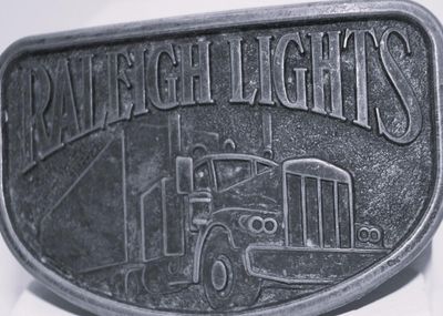 Raleigh Lights" with Semi-Truck Belt Buckle 3½" x 2¼"
