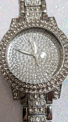 Sale Photo Thumbnail #260: Silver Colored VERY JEWELED BAND & DIAL WATCH with BAND: (Jeweled Clear Stones Segments 8") DIAL: (1¼" Silver Tone with Jeweled Surround + Round) BATTERY: Button 20 mm  *EXTRA BATTERY INCL.*
ALL ITEMS SHIPPED FREE