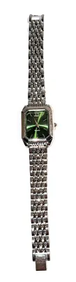 Sale Photo Thumbnail #279: GREEN Colored DIAL WATCH with BAND: (Silver Tone Segments, 7") DIAL: (1" Green + Rectangle) BATTERY: Button 20 mm  *EXTRA BATTERY 
INCL.*
ALL ITEMS SHIPPED FREE