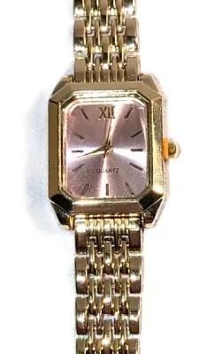 Sale Photo Thumbnail #281: PINK Colored DIAL WATCH with BAND: (Gold Tone Segments, 7") DIAL: (1" Pink + Rectangle) BATTERY: Button 20 mm  *EXTRA BATTERY INCL.*
ALL ITEMS SHIPPED FREE