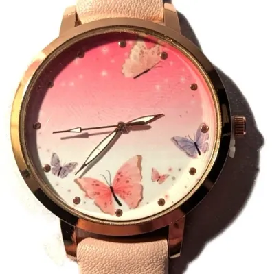 Sale Photo Thumbnail #401: "PINK & WHITE BUTTERFLIES" WATCH with BAND: (LIGHT PINK / Faux Leather 9") DIAL: (1½"  Pink & White +Rose Gold Surround,  ROUND) BATTERY: Button 20 mm  *EXTRA BATTERY INCL.*
ALL ITEMS SHIPPED FREE