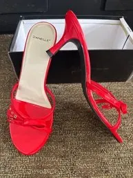 Danelle red patent leather kitten heel sandals with bow detail, shown with original box.