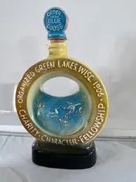 Vintage ceramic decanter commemorating the Order of the Blue Goose, organized in Green Lake, Wisconsin in 1906, featuring a circular...