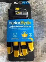 New in packaging HydraHyde water-resistant leather work gloves in size large, featuring a yellow and black design.