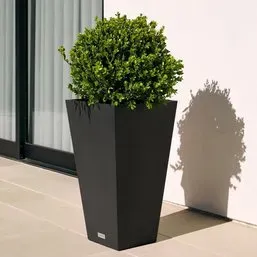Modern tall tapered square planter in matte black, featuring a clean minimalist design suitable for indoor or outdoor use.