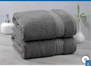 Pair of plush, dark gray cotton bath towels, neatly folded and in excellent condition.