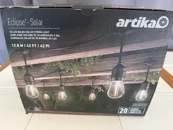 Artika Eclipse-Solar 42-foot outdoor string light set with 20 LED bulbs, in its original box.