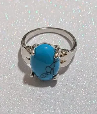 **NEW ARRIVAL** Size 7½ BLUE "Crackled" Oval Cabochon 4-Prong Stone RING with a "PUFFY HEARTS" Band in a Silver Tone...