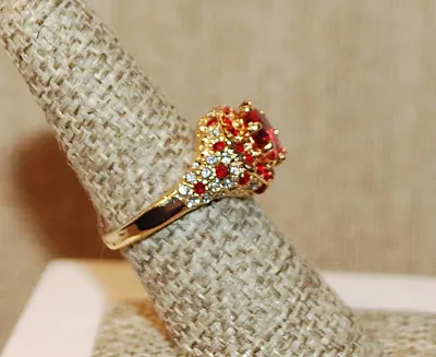 Size 7 Beautiful Bejeweled RED RING with Large Pink/Red Round Stone and Red & Clear Surround and Accent Stones on a Gold Tone Setting...