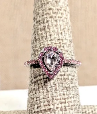 Size 7 Light Pink Pear Shaped Main Stone RING with Pink Stones Surround and Pink Side Accent Stones on a Silver Tone Setting + Band (2.2g)