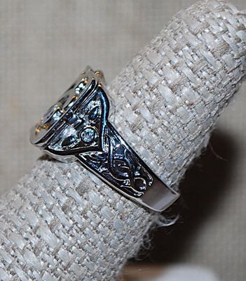 Size 7 "HIDDEN CAMPARTMENT" RING with Single Clear Round Off-Center Stone & Graphic Designed Silver Tone Setting and Band...