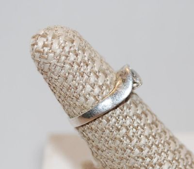 Size 6¼ Solitaire Clear Stone with "Wrap-a-Round" Silver Tone Band (2.4g)