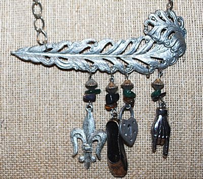 ***NEW SALE PRICE*** Silver Tone METAL FEATHER NECKLACE with 4 Assorted Charms and Beads on a Silve Tone Chain & Circle Clasp 17" L