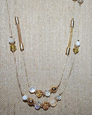 Very Cool Double Strands Gold Tone NECKLACE with Gold, Clear & Taupe Beads and Rope Style Capped Accents with Lobster Clasp