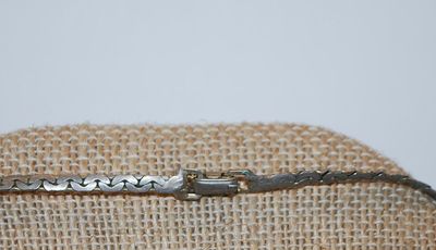 ***NEW SALE PRICE*** VINTAGE GREEN SQUARE Stones BOW PENDANT (1½" x 1½") with 2 Jeweled Smaller Bows on a "Snakeskin"...