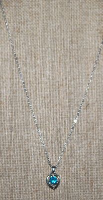 Round Blue Stone in a HEART Setting PENDANT (½" x ½") on a Silver Tone Necklace Chain 16" L
