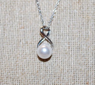 Faux White Pearl PENDANT (¾" x ¼") on a Figure 8 Setting and with a Silver Tone Necklace Chain 16" L