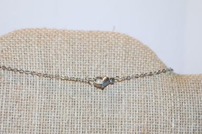 Faux White Pearl PENDANT (¾" x ¼") on a Figure 8 Setting and with a Silver Tone Necklace Chain 16" L