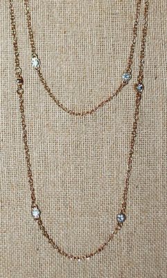 Long WRAP-AROUND 4 Strand NECKLACE - Marked "EXPRESS" - with Cupped Round Clear Stone Accents on a Gold Tone Chain and Lobster...