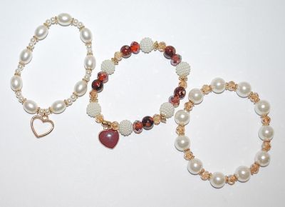 Collection of 3 Pearl-Style Elastic BRACELETS (2" Opening) with HEARTS and Brown and Champagne Colored Bead Accents