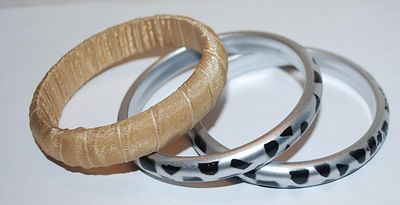 Collection of 3 BANGLE BRACELETS (2½" Opening) with 2 "Zebra Style" and 1 Wrapped in Glittery Beige Material