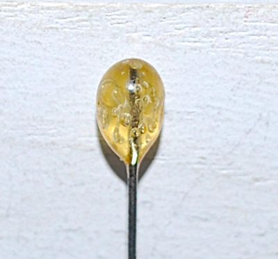 AMBER TEARDROP PIN (3" L) on a Silver Tone Setting