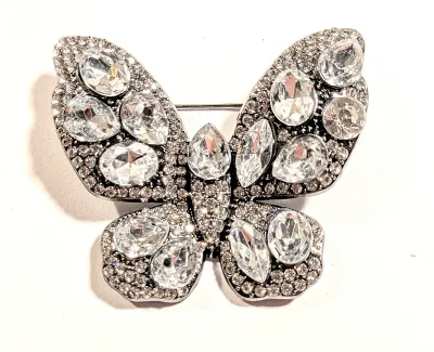 **NEW ARRIVAL** All CLEAR STONES BUTTERFLY BROOCH (1¾" x 1½") with Large Clear Teardrop Beveled Stones and Tiny Accent Body...