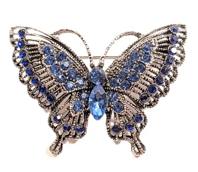 **NEW ARRIVAL** Medium Size BLUE JEWELED BUTTERFLY BROOCH (2" x 1½") with 2 Shades of Blue Stones and Silver Colored Wings on a...