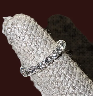 Size 8-11 STRETCH Infinity Style RING with Row of Clear Round Stones on a Silver Tone Setting (1.1g)