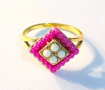 **NEW ARRIVAL** SIZE 9 This RING has 4 White Globes Center and is Surrounded by Magenta Colored Globes. Design Extends to the Shoulders...