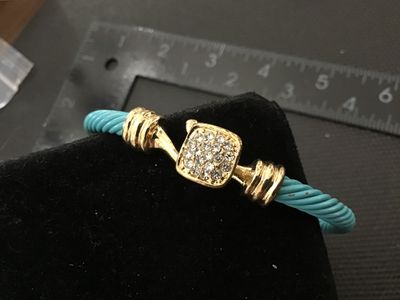 Gold-Tone and Turquoise-Colored Cable Cuff Bracelet with Rhinestone Center