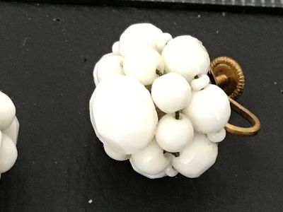 Sale Photo Thumbnail #105: Pair of vintage mid-century cluster screw-back earrings featuring opaque white glass beads on gold-tone metal backings. Stamped 'WEST GERMANY' on the screw hardware. In good vintage condition with minor surface age appropriate wear to metal backs.