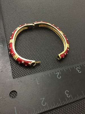 Red Enamel and Gold Tone Hinged Bangle Bracelet