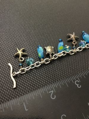 Silver Tone Ocean Theme Charm Bracelet with Sea Turtles and Starfish