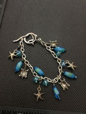 Silver Tone Ocean Theme Charm Bracelet with Sea Turtles and Starfish