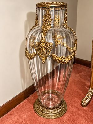 Sale Photo Thumbnail #12: Large Neoclassical style fluted clear glass floor vase featuring ornate gilt metal mounts and base.