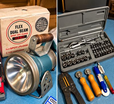 Sale Photo Thumbnail #39: Vintage Flex Dual Beam lantern with original box beside a socket set, wire strippers, and specialty hand tools.