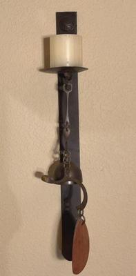 Heavy metal candle sconce with bell