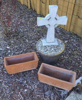 Resin cross in plastic planter