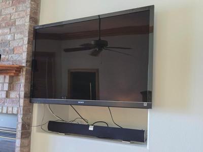 Sony Bravia Flat Screen Television And Vizio Sound Bar
