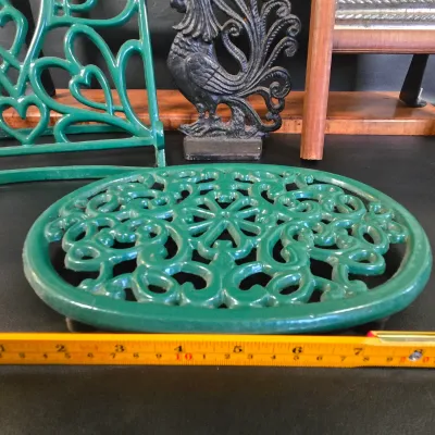 LOT 47K: Cast Iron Trivet, Cookbook Stand, Napkin Holder, Spool Holder, & Rooster Bookend, Dubl Handi Washboard, and General Store...