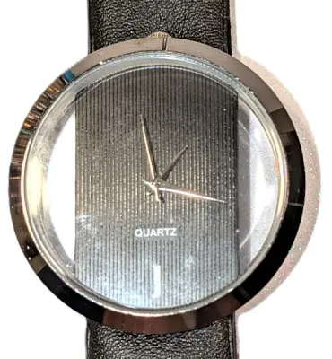 Sale Photo Thumbnail #145: BLACK "CLEAR DIAL" WATCH with BAND: (Black/Faux Leather 8¾") DIAL: (2"  CLEAR + ROUND) BATTERY: Button 20 mm  *EXTRA BATTERY INCL.*
ALL ITEMS SHIPPED FREE