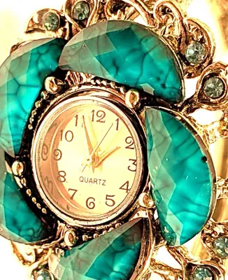 Sale Photo Thumbnail #120: VINTAGE + TURQUOISE STYLE CUFF BANGLE WATCH with BAND: (Silver Color (2½" Opening) Snap-Over Clasp) DIAL: (½" White + Round) BATTERY: Button 20 mm  *EXTRA BATTERY INCL.*
NOTE: Band has Tarnish/"Rust Spot"
ALL ITEMS SHIPPED FREE